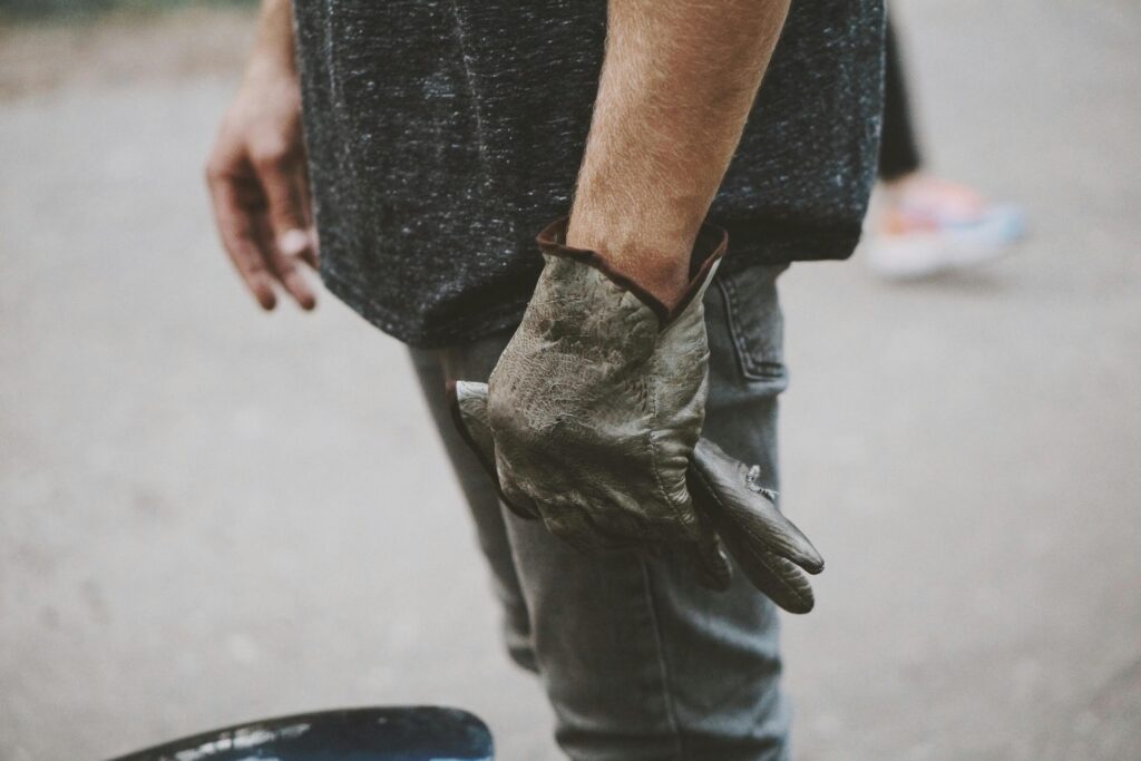 Industrial work gloves used in daily operations supported by an erp company for the workwear industry managing production, materials, and execution.