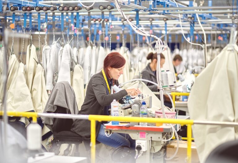 Textile production environment featuring advanced machinery and erp for apparel manufacturing technology to improve factory efficiency.