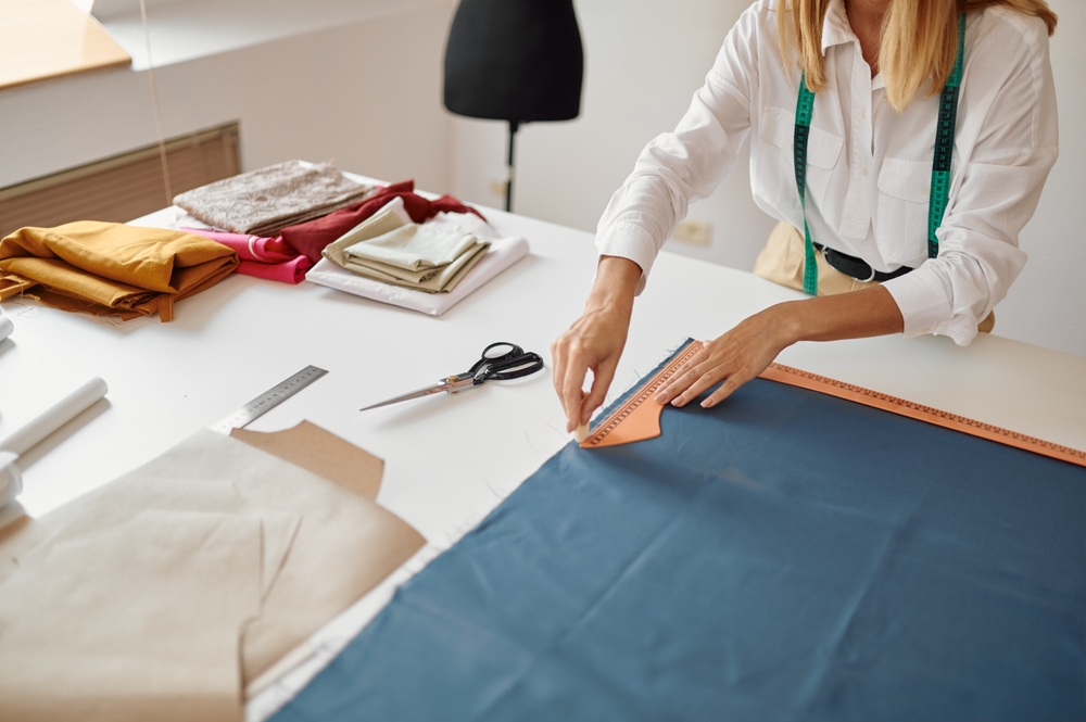 Industrial clothing manufacturing line featuring advanced machinery supported by garment costing software for efficient production workflows.
