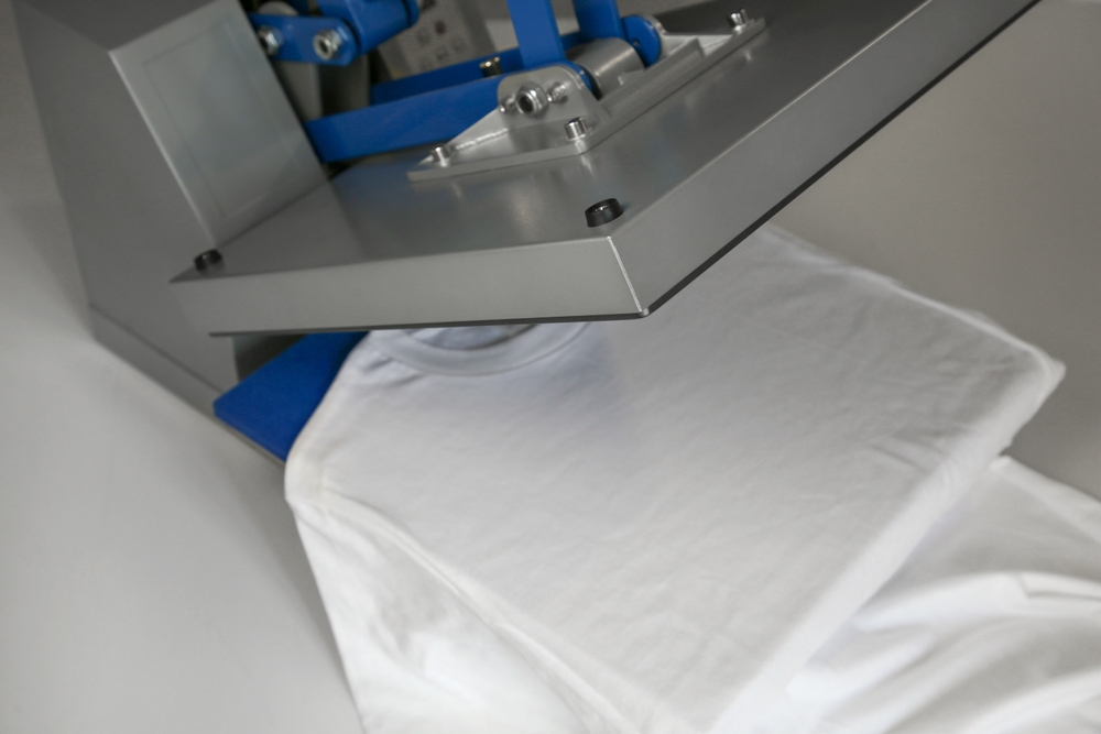 Apparel manufacturing facility with textile production equipment using software for garment costing and margin analysis to improve production planning and profitability.