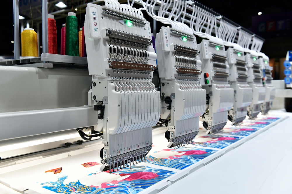 Modern clothing manufacturing facility with automated production equipment supported by textile-erp-consulting for streamlined factory operations.