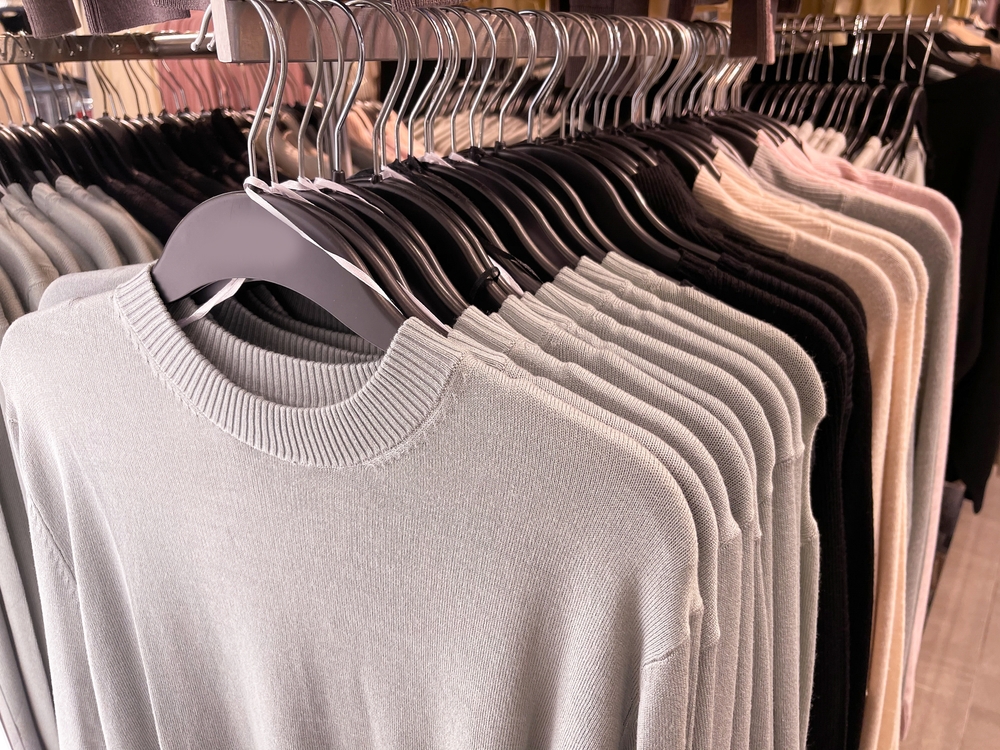 Garment production facility with advanced textile machinery illustrating the benefits of textile-erp-consulting for manufacturing efficiency.