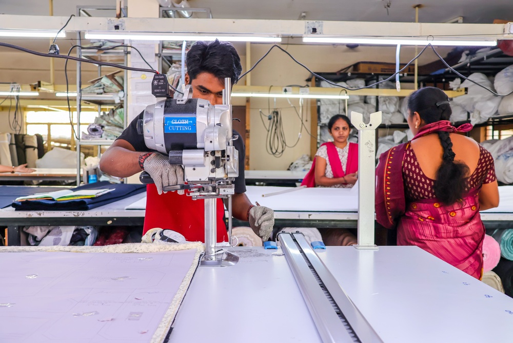Clothing manufacturing equipment operating in a modern textile factory with textile-erp-consulting supporting production planning and process optimization.