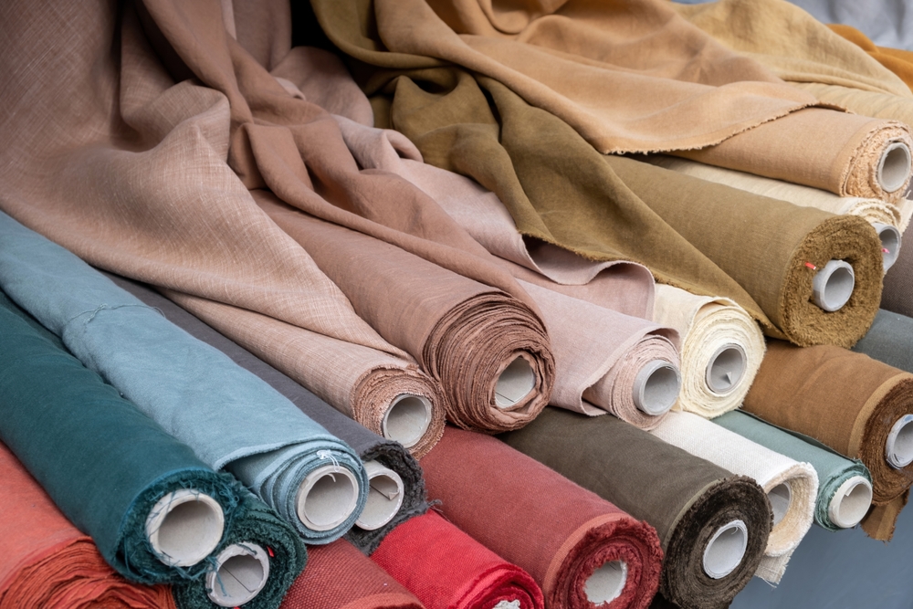 Apparel manufacturing facility with garment production lines using best garment production tracking software to monitor workflow, efficiency, and output.