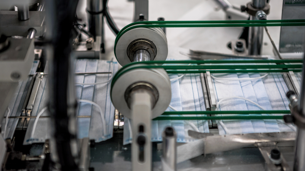 Modern textile factory featuring automated production equipment supported by best garment production tracking software for real time manufacturing visibility.