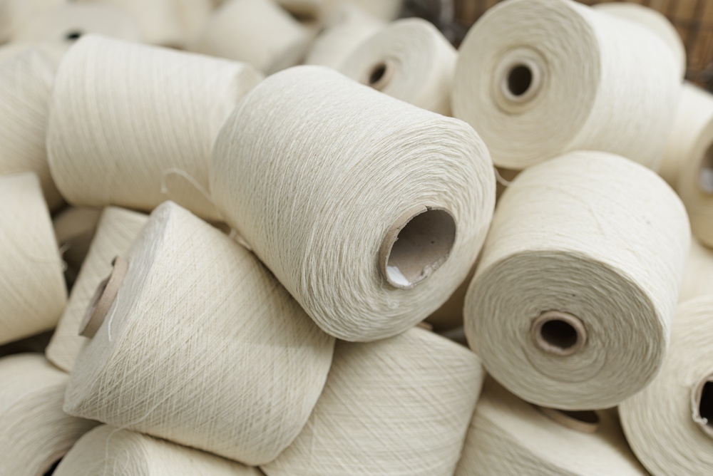Apparel production thread rolls counted using PolyPM apparel production planning software on the factory floor