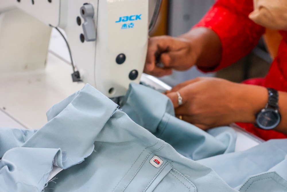 Sewing line operator working to a schedule built in PolyPM apparel production planning software