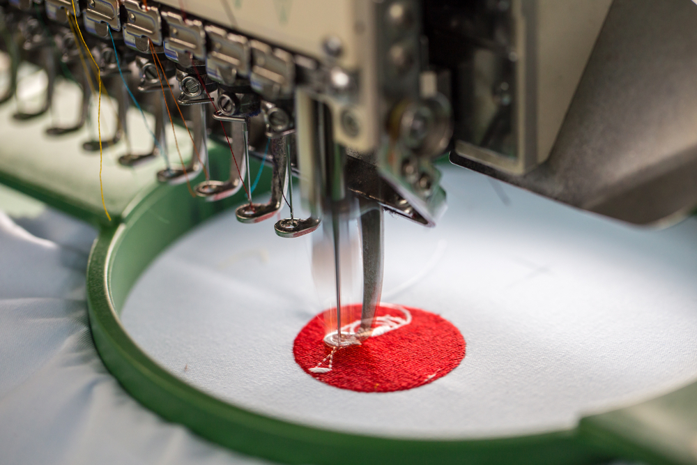 Apparel quality control check moving through a garment sewing line
